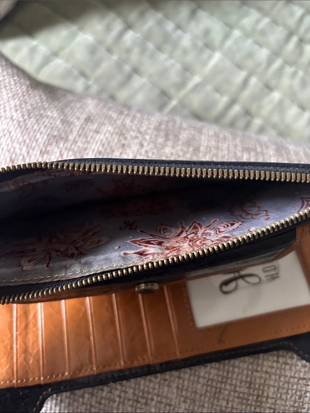 HOBO Black and Tan Leather Zip Wallet